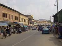 Street scene with cars and buildings.