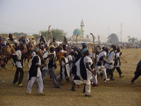 Infantry in black and white outfits carrying clubs