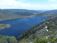 A lake surrounded by mountains.