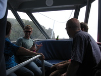 Inside a small boat, a group of people.