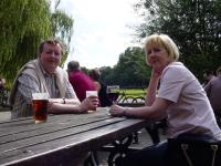 Picture of my parents sitting outside a pub