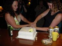 Cat and Hen cutting their birthday cake