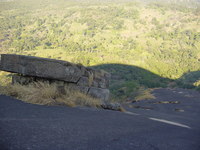 Slabs of rock balanced on a steep slope