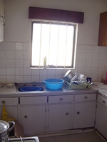 Picture of the kitchen, showing the sink and window