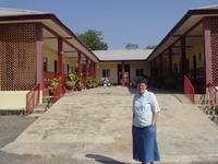 Sister Brenda standing in the courtyard of the school