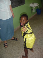 Little girl dancing and sticking her tongue out