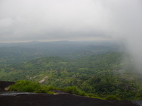 View from the top of the rock, clouds rolling in from the right