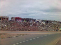 Concrete rubble in front of a market