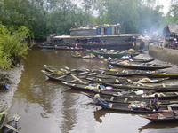Market boat and canoes at Akassa market
