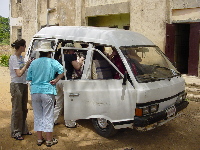 Loading everyone into the minibus