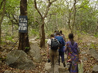 Path to the waterfall, with signs and benches