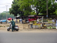 Street scene in Kaduna, showing roadside stalls