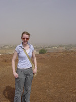 Eleanor standing on top of a flat hill