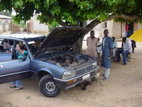 Car being repaired at the roadside