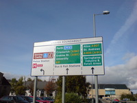 A directional sign at the Craigs roundabout.