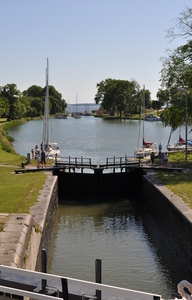 A short stretch of canal with two lock gates which then broadens into a basin, narrows again for more locks and leads to a lake.