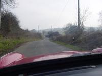 View out of the front windscreen of a Triumph Spitfire, somewhere in the middle of nowhere, Suffolk